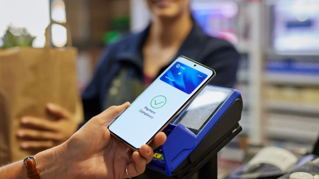 Close up of mobile payment at checkout