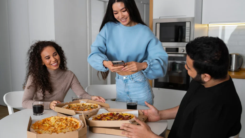group of three people ordering food from online and enjoying, order food online from apps or website