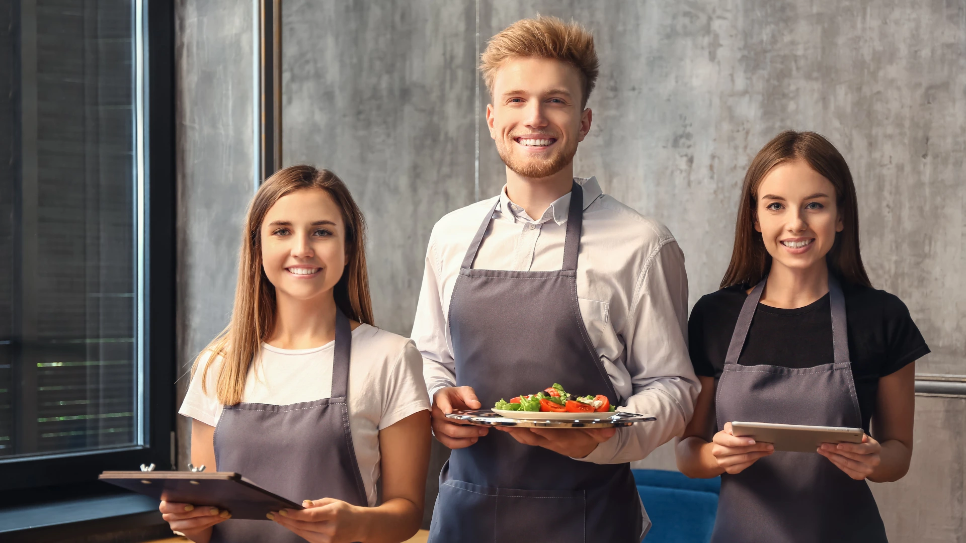 happy restaurant owners after knowing how to increase online restaurant sales